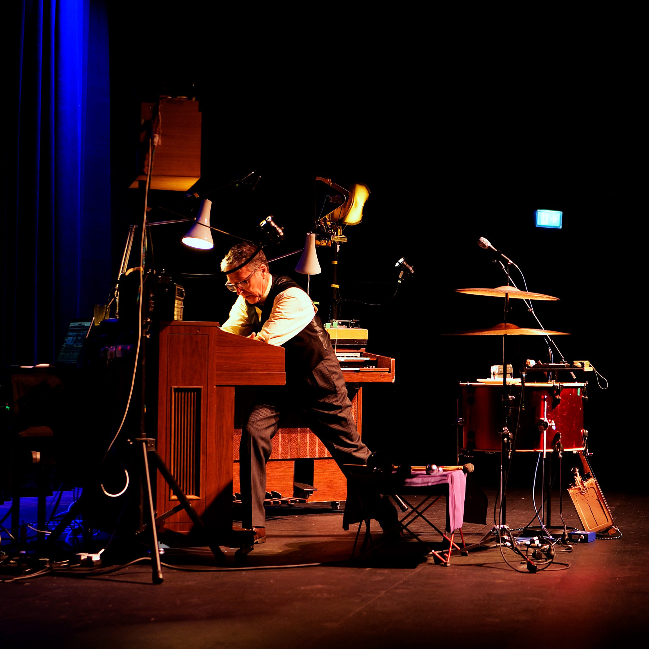 Graeme Leak performing SAVED on a small stage in Orkney